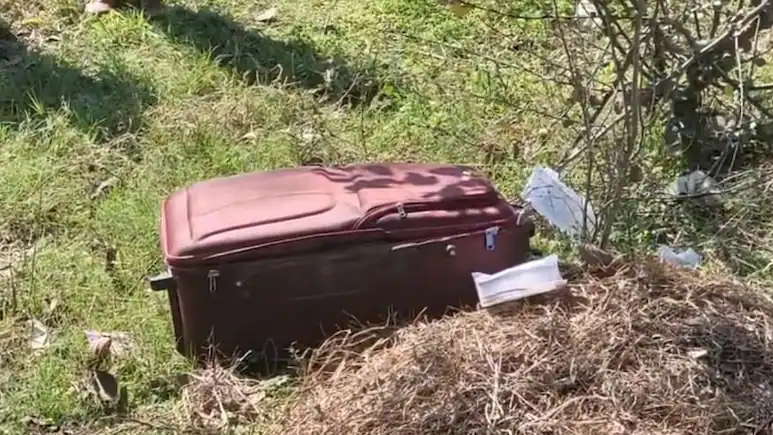 Woman's Half-Burnt Body Found In Suitcase 