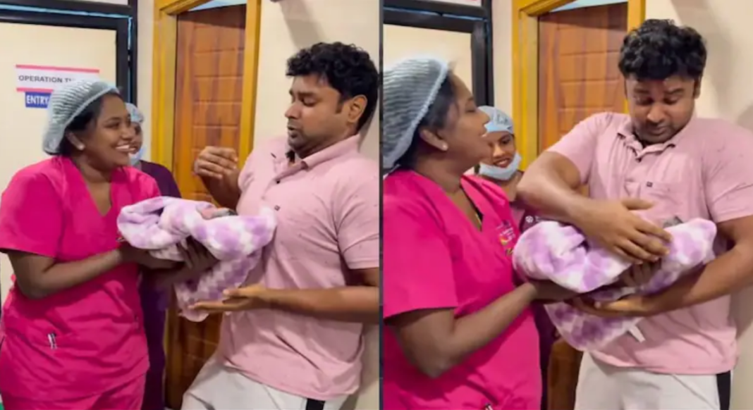 Father Holding Newborn Video Viral