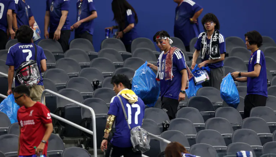 Japan Fans Cleaning Stadium