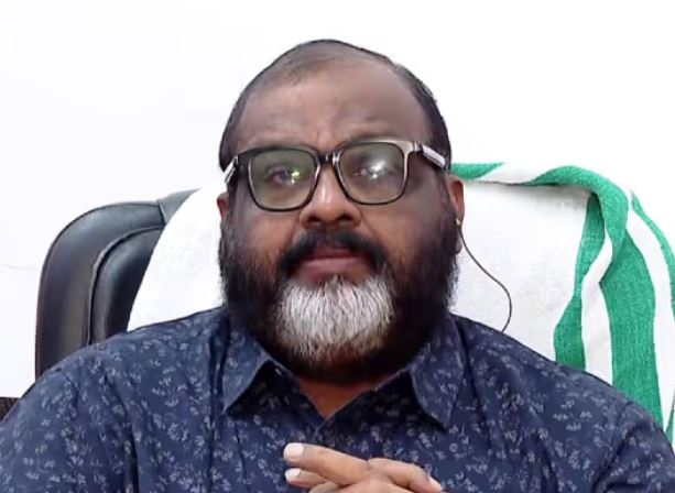 Transport Minister CP John